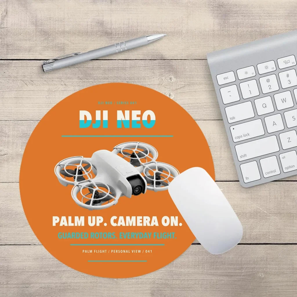 DJI Neo design on orange round mouse pad