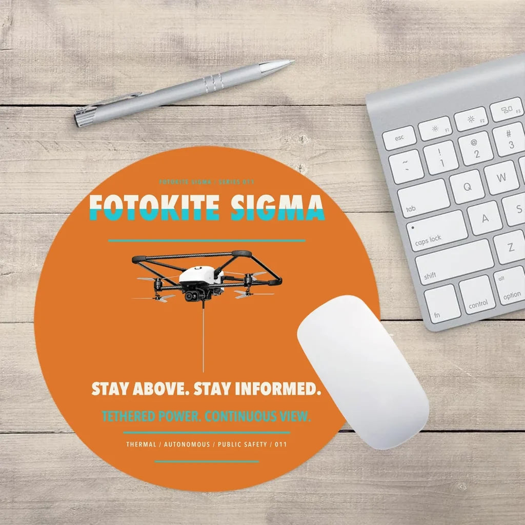 Fotokite Sigma design on orange round mouse pad