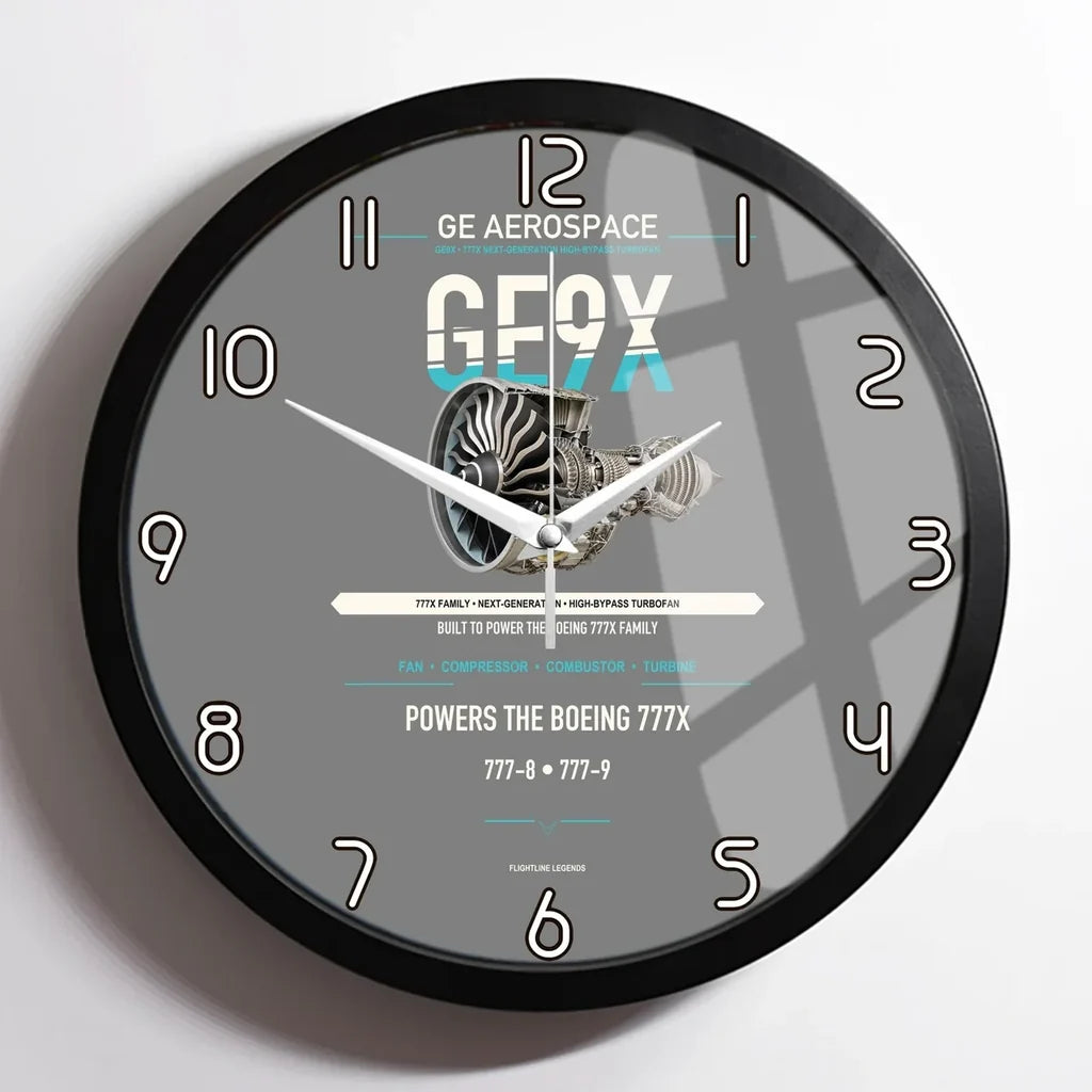 GE9X design on gray framed wall clock