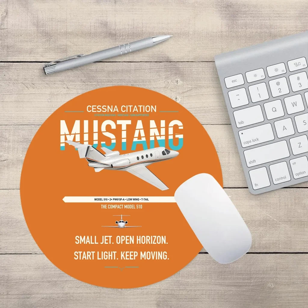 Cessna Citation Mustang design on orange round mouse pad