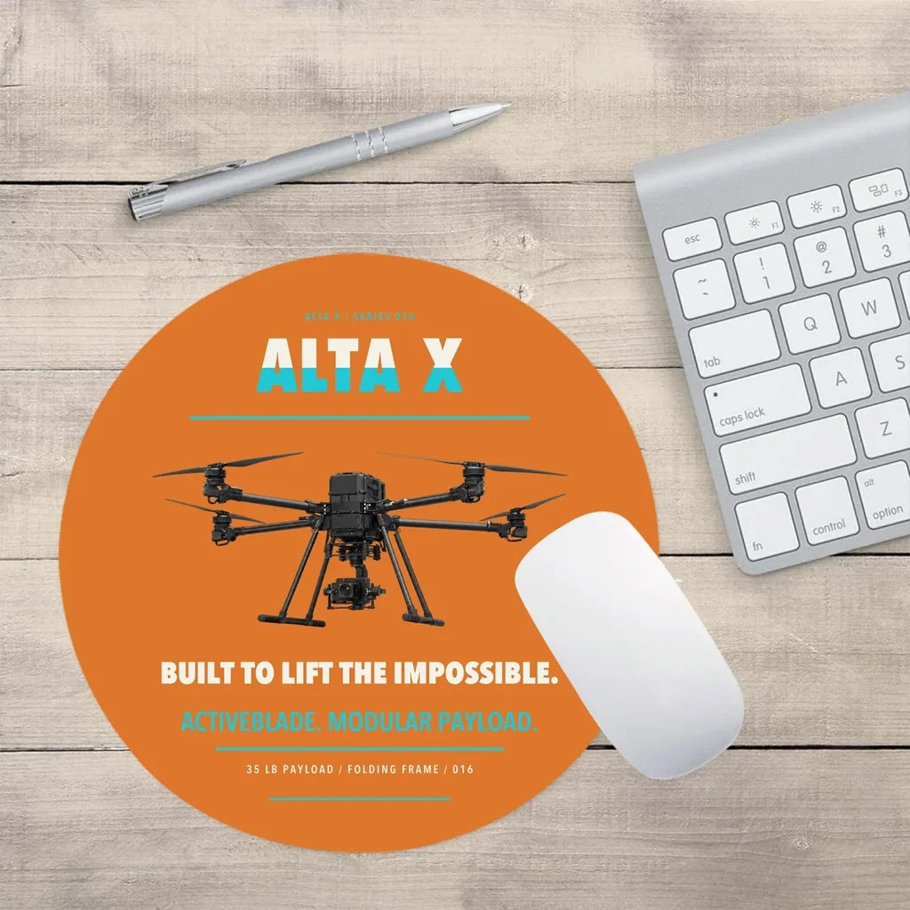 Freefly Alta X design on orange round mouse pad
