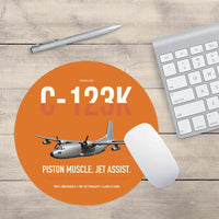 Thumbnail for C-123K Provider design on orange round mouse pad