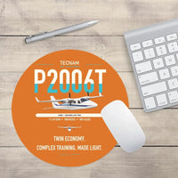 Thumbnail for Tecnam P2006T design on orange round mouse pad