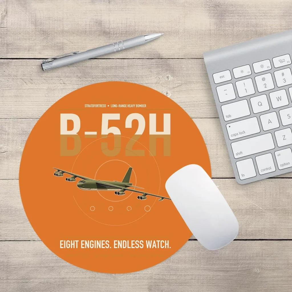 B-52H Stratofortress design on orange round mouse pad