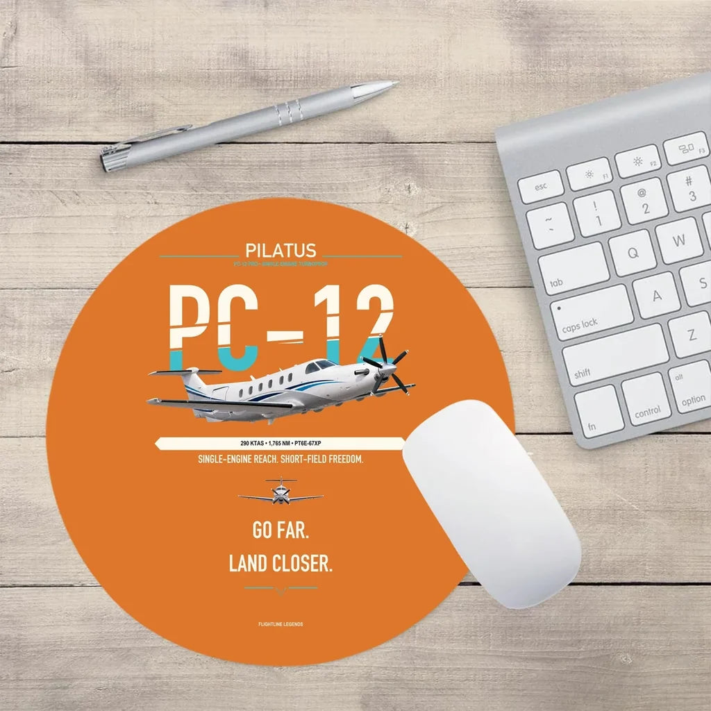 Pilatus PC-12 PRO design on orange round mouse pad