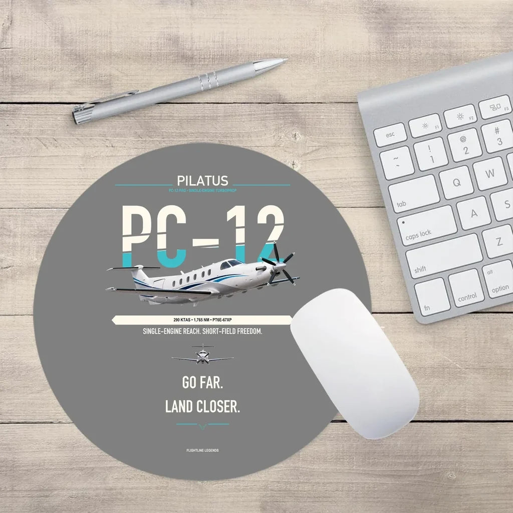 Pilatus PC-12 PRO design on gray round mouse pad