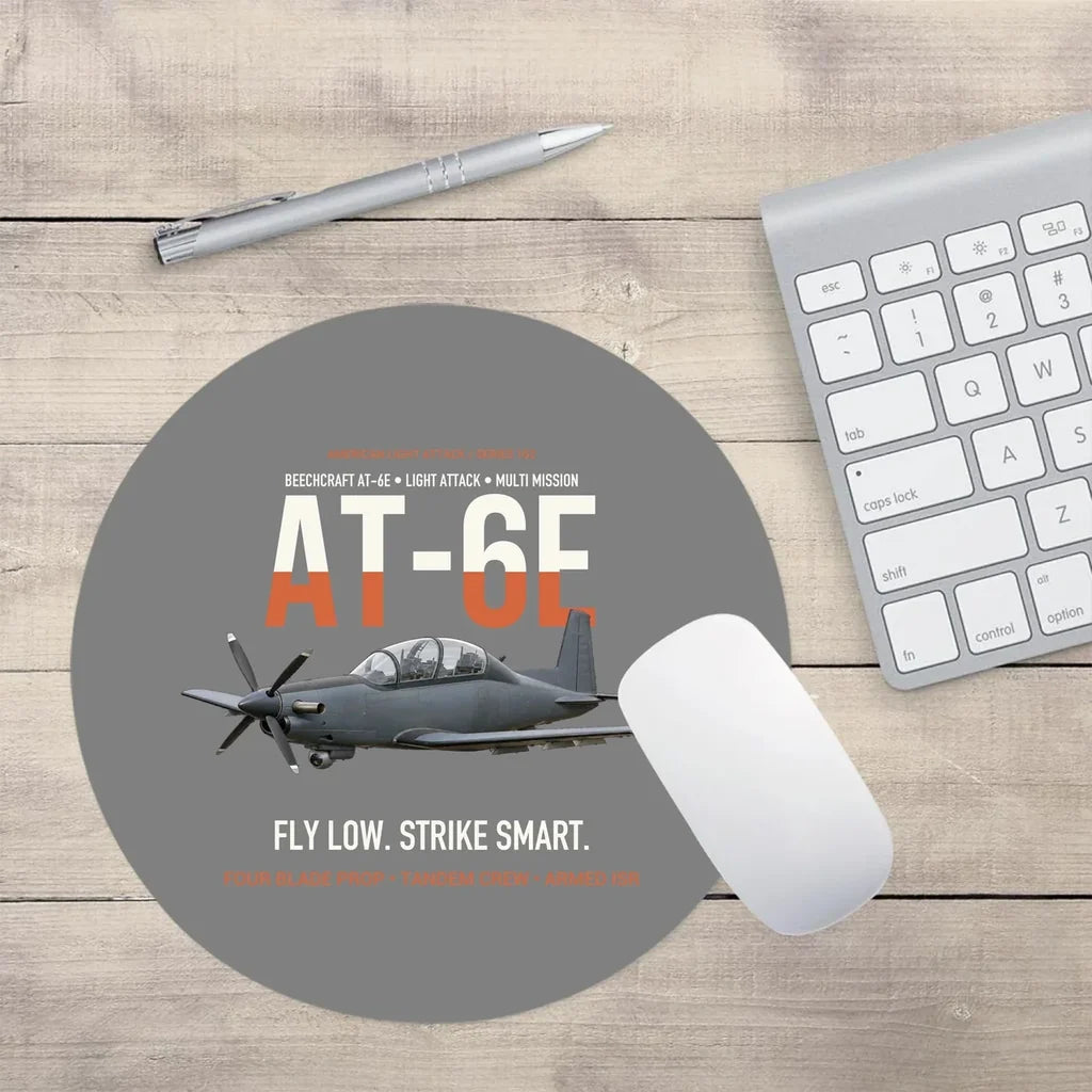 AT-6E Wolverine Light Attack design on gray round mouse pad