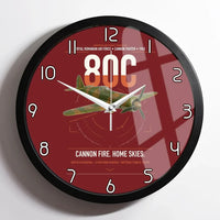 Thumbnail for IAR 80C design on dark red framed wall clock