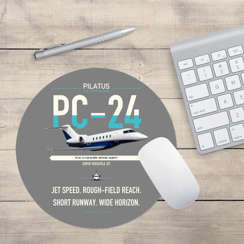 Pilatus PC-24 design on gray round mouse pad
