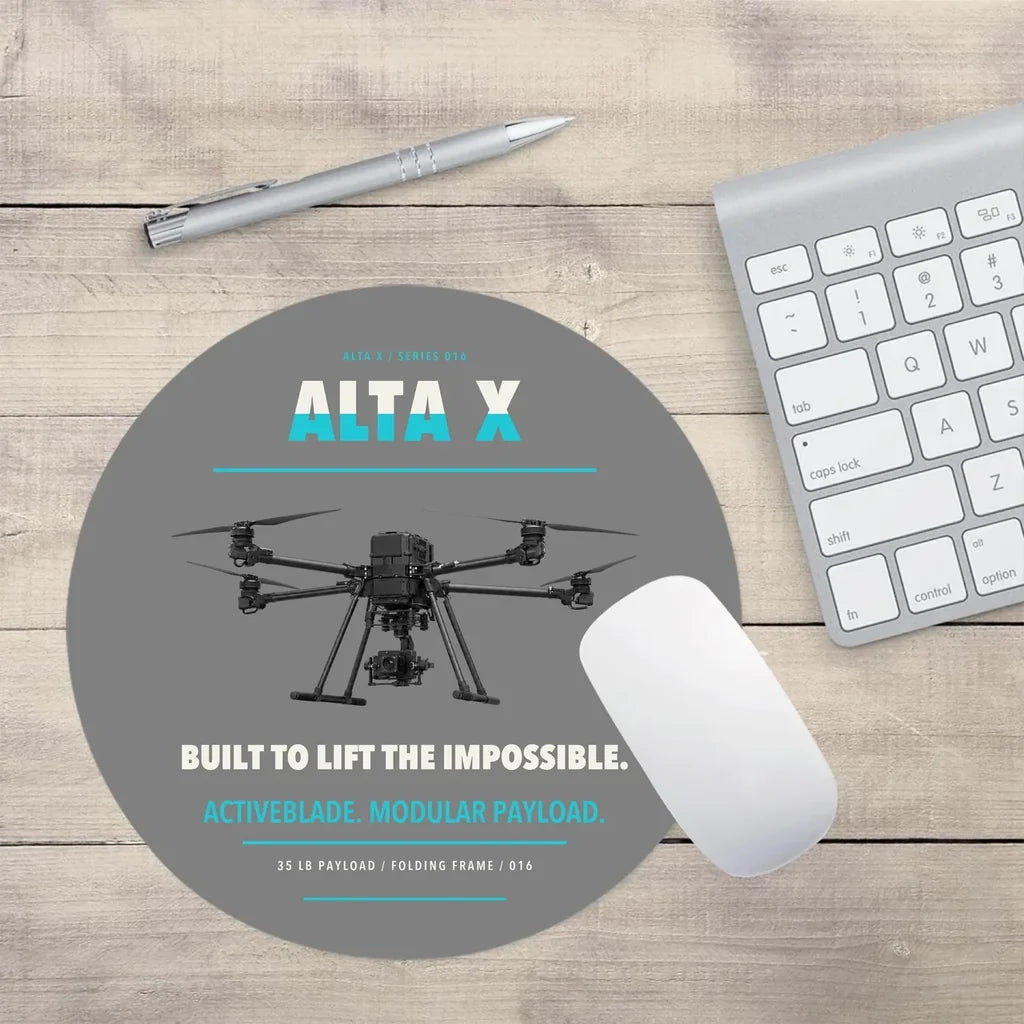 Freefly Alta X design on gray round mouse pad
