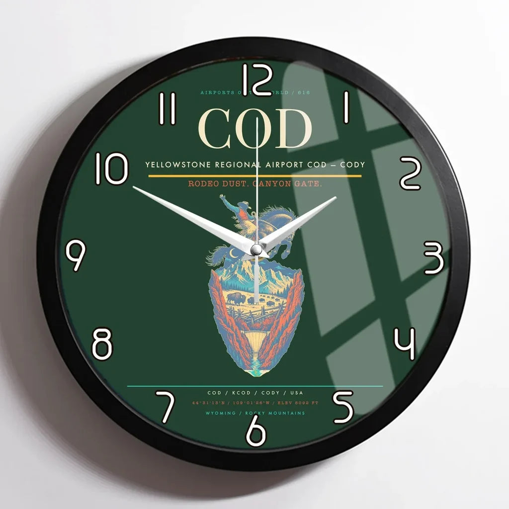 Yellowstone Regional Airport (COD) design on dark green framed wall clock