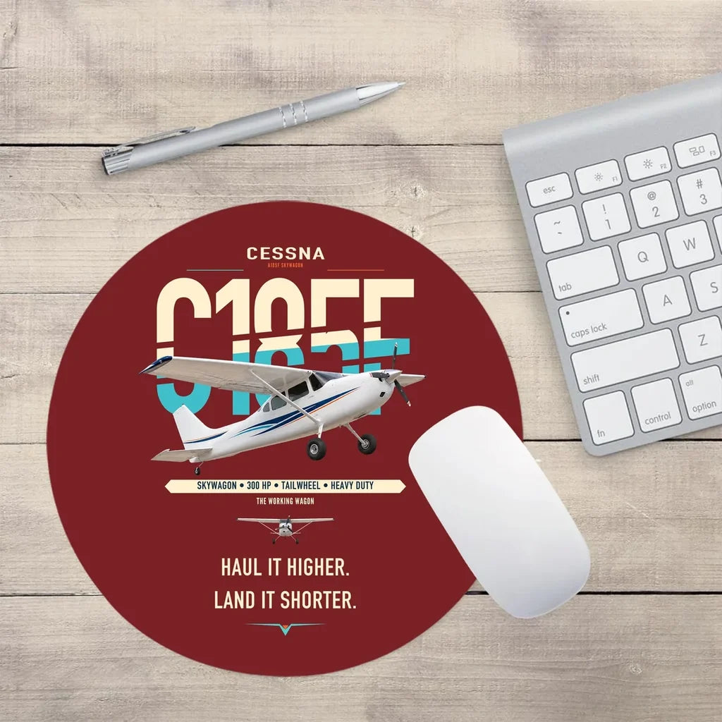 Cessna A185F Skywagon design on dark red round mouse pad