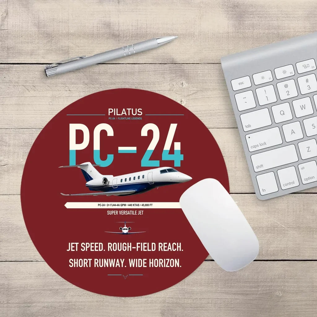 Pilatus PC-24 design on dark red round mouse pad