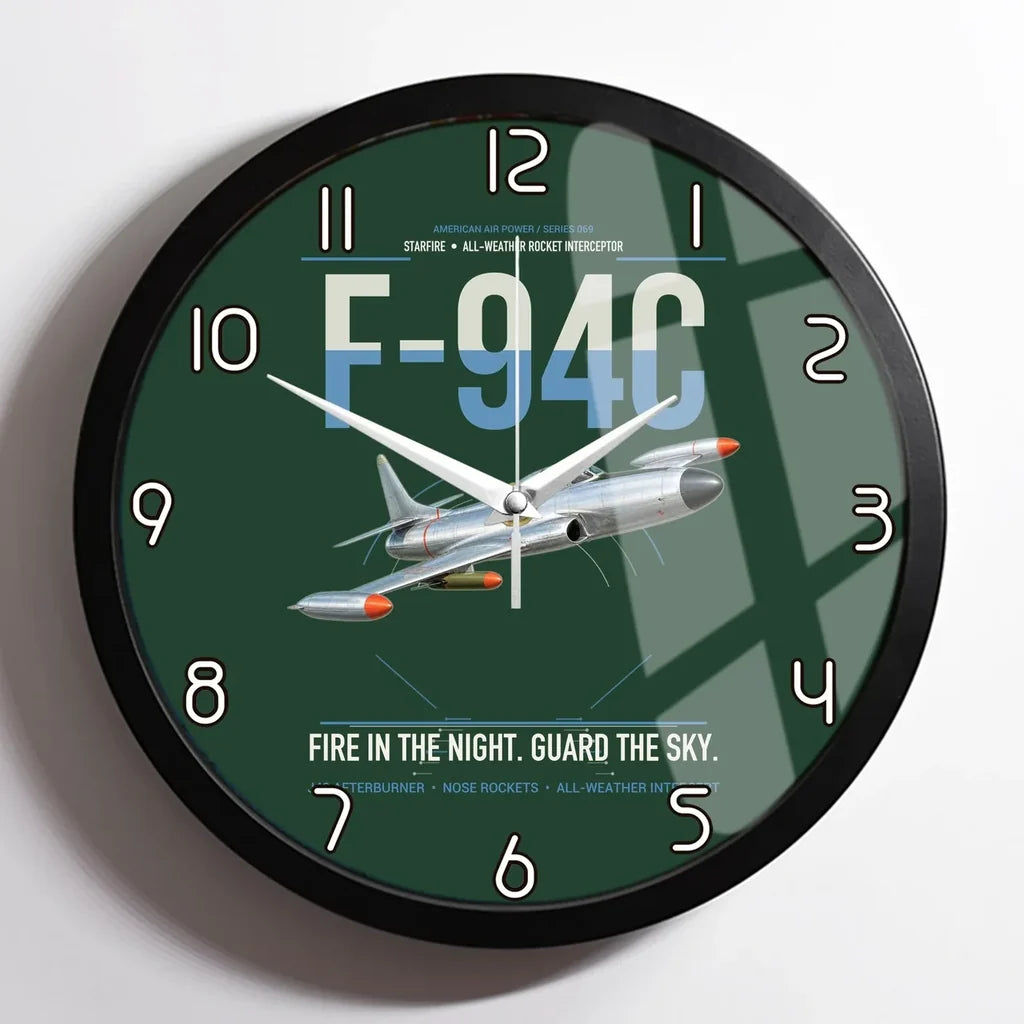 F-94C Starfire design on dark green framed wall clock
