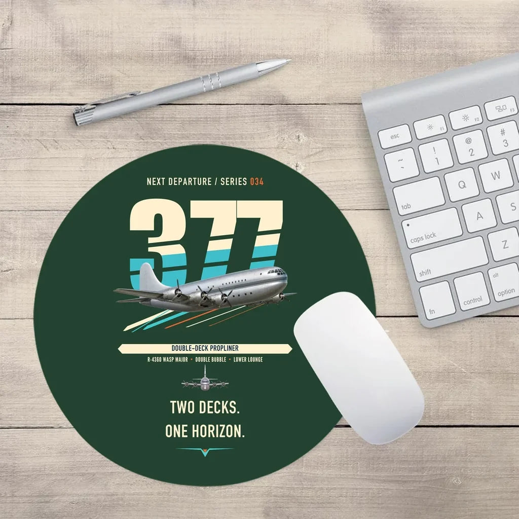 Boeing 377 Stratocruiser design on dark green round mouse pad
