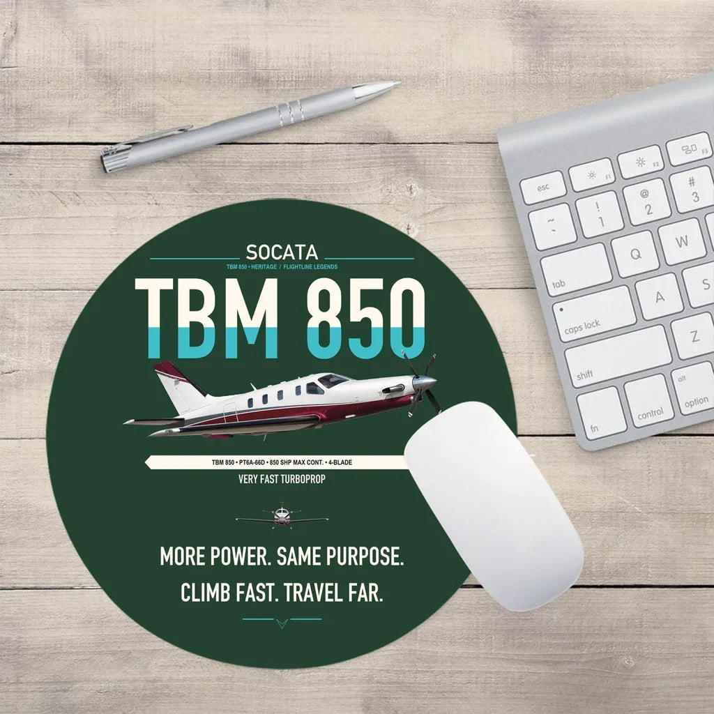 Socata TBM 850 design on dark green round mouse pad