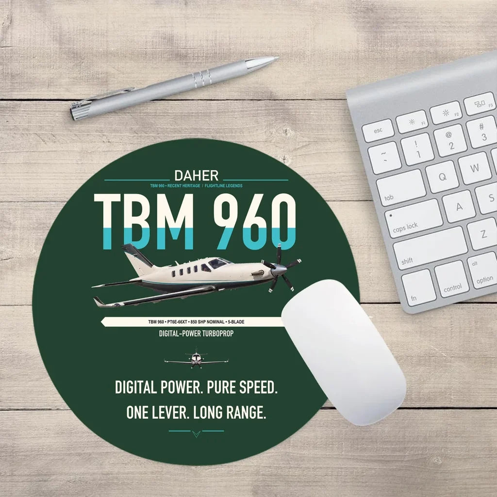 Daher TBM 960 design on dark green round mouse pad