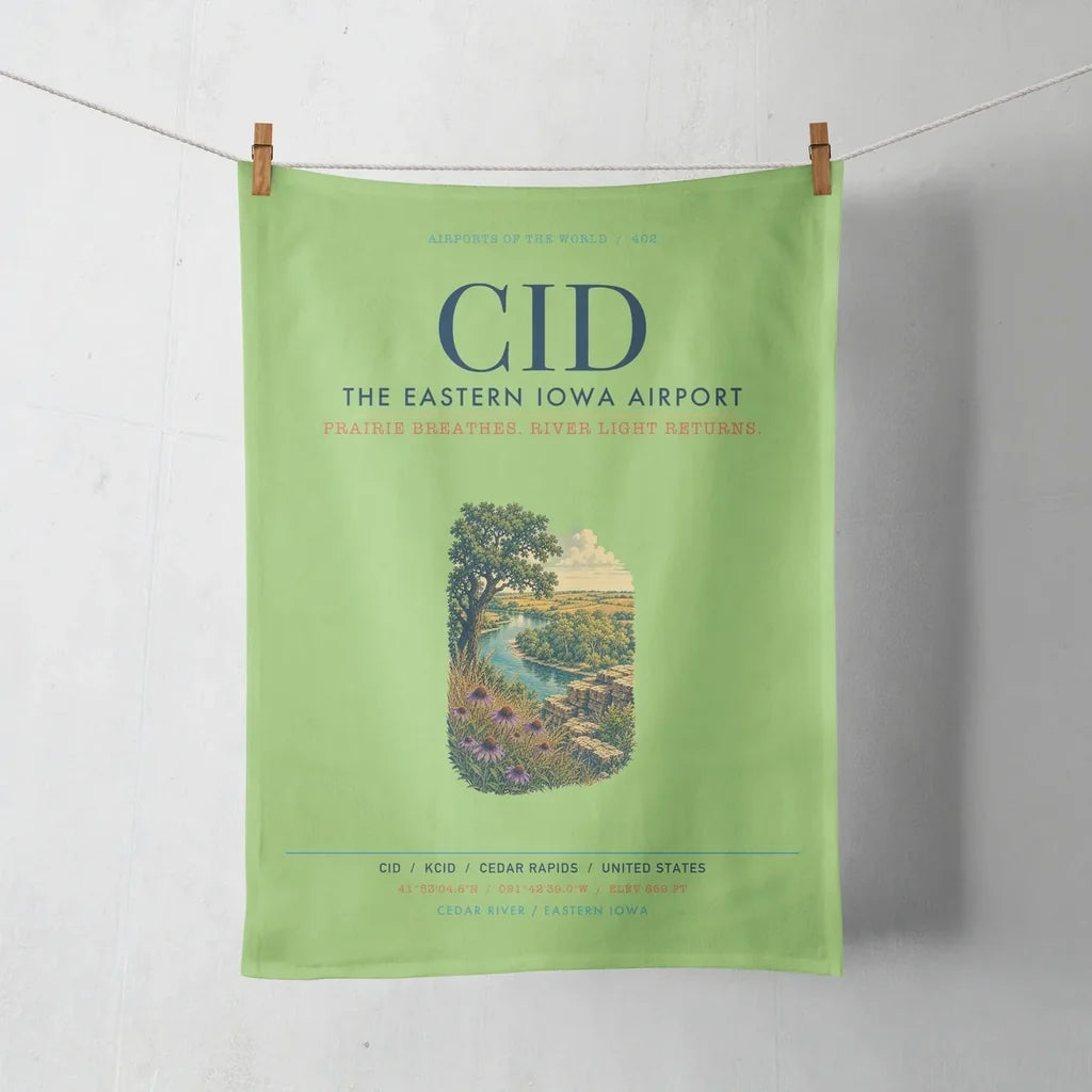 The Eastern Iowa Airport Cedar Rapids (CID) design on light green towel