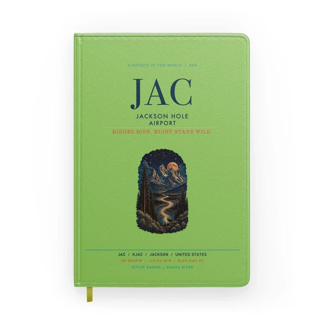 Jackson Hole Airport (JAC) design on light green notebook