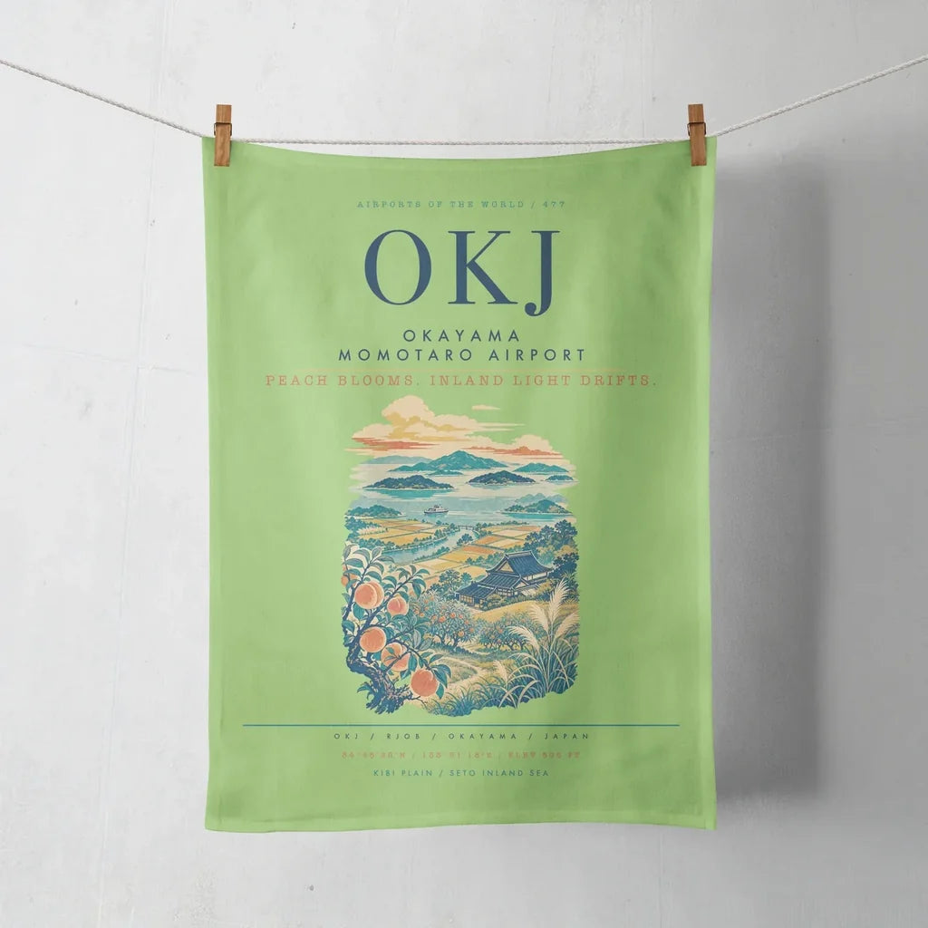 Okayama Momotaro Airport (OKJ) design on light green towel