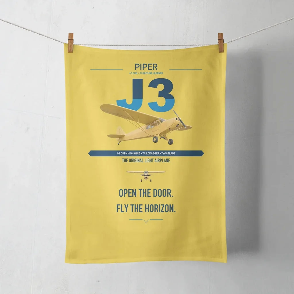 Piper J-3 Cub design on yellow towel
