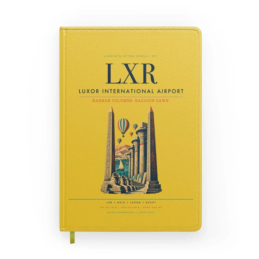 Luxor International Airport (LXR) design on yellow notebook