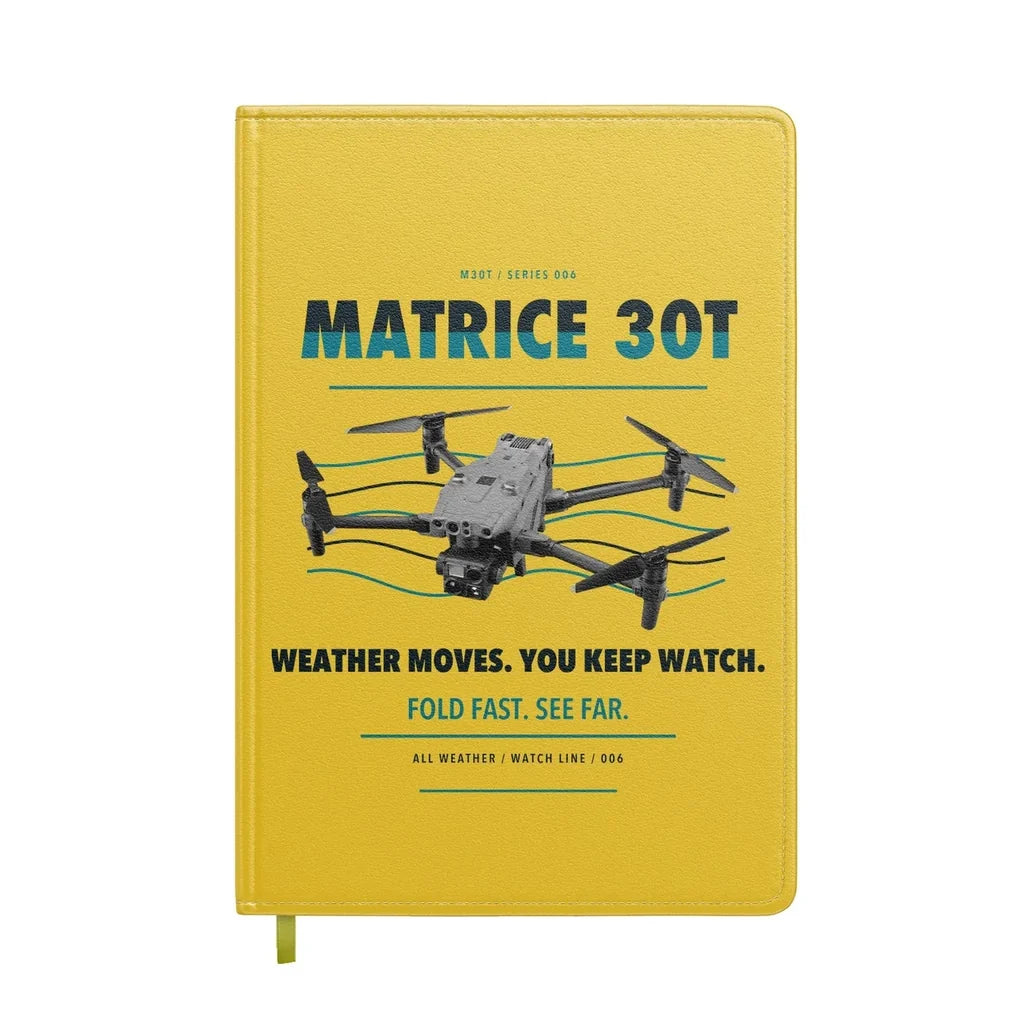 DJI Matrice 30T design on yellow notebook
