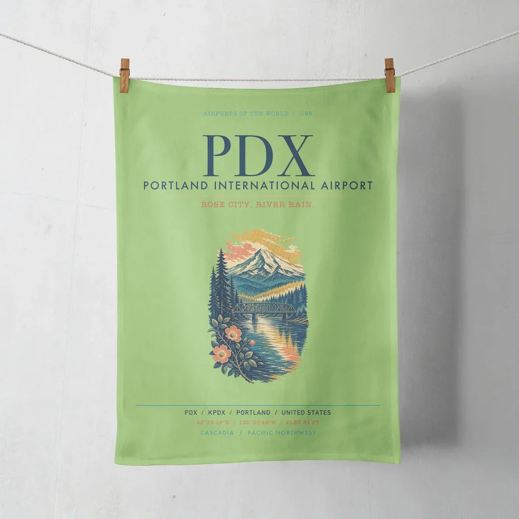 Portland International Airport (PDX) design on light green towel
