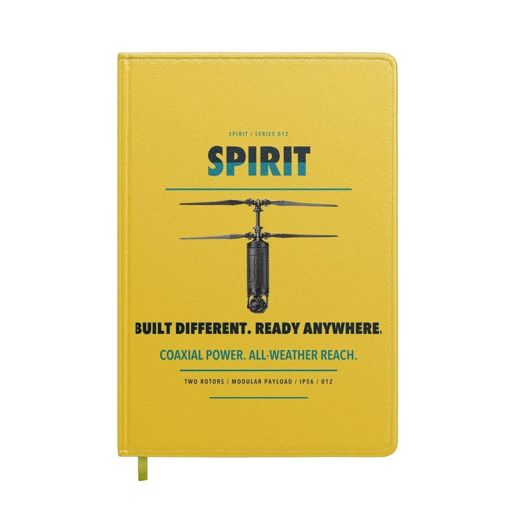 Ascent AeroSystems Spirit design on yellow notebook