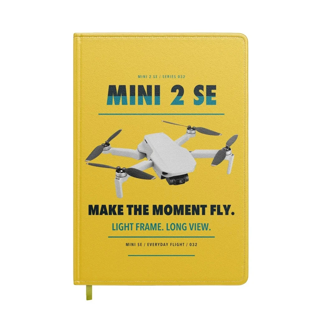 DJI Mini 2 SE design on yellow notebook