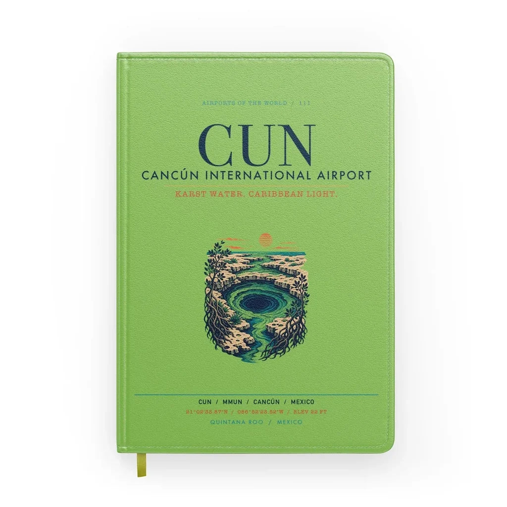 Cancún International Airport (CUN) design on light green notebook