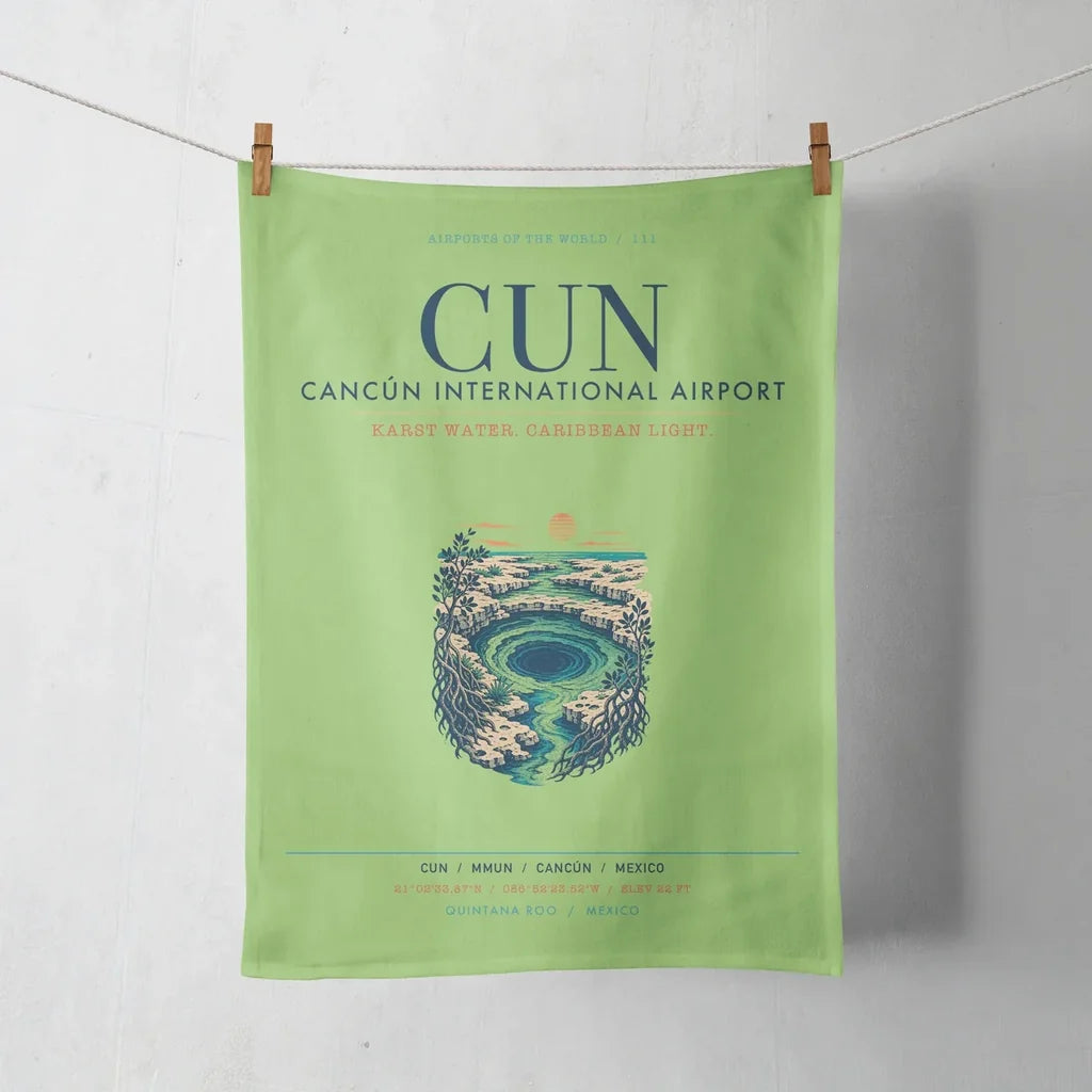 Cancún International Airport (CUN) design on light green towel