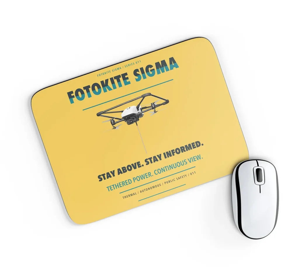 Fotokite Sigma design on yellow rectangle mouse pad