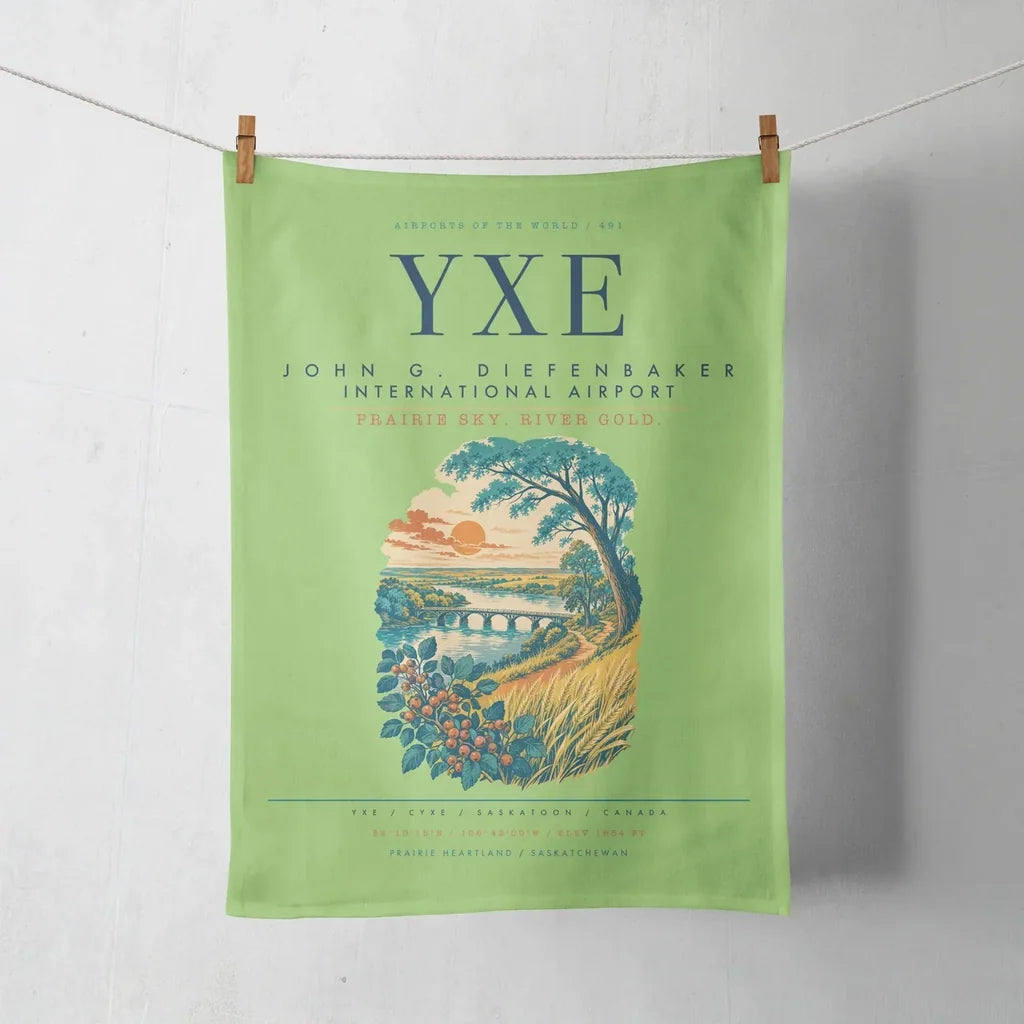 Saskatoon John G. Diefenbaker International Airport (YXE) design on light green towel