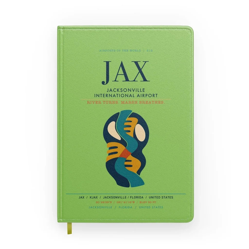 Jacksonville International Airport (JAX) design on light green notebook