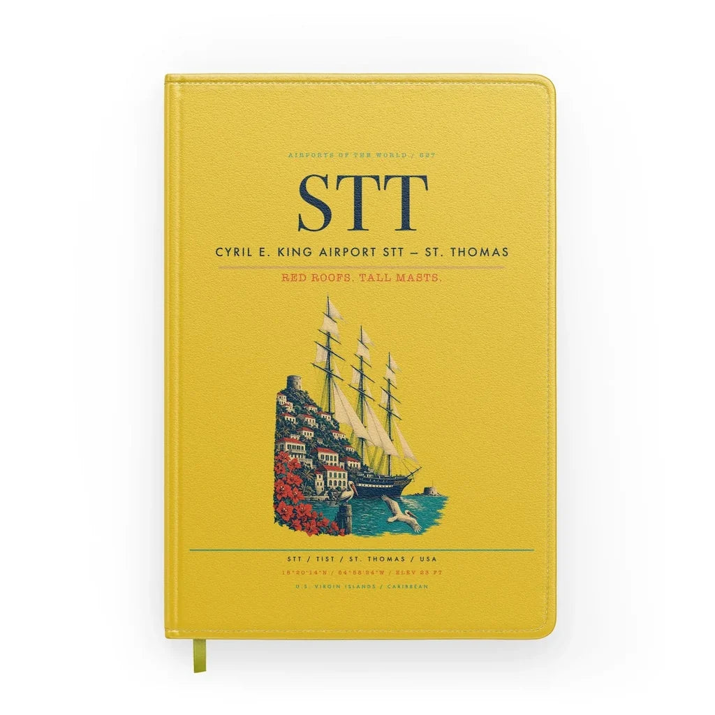 Cyril E. King Airport (STT) design on yellow notebook