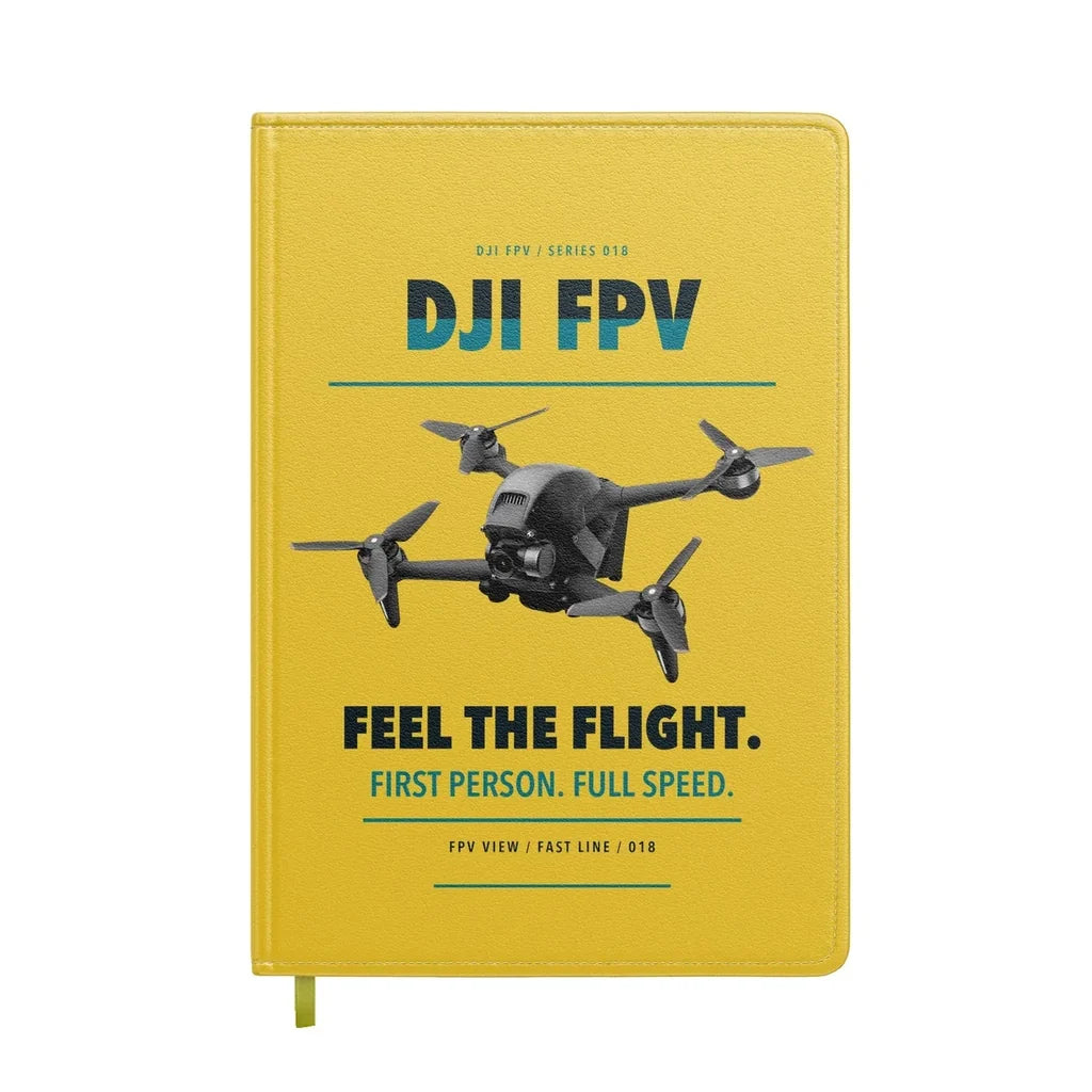 DJI FPV design on yellow notebook