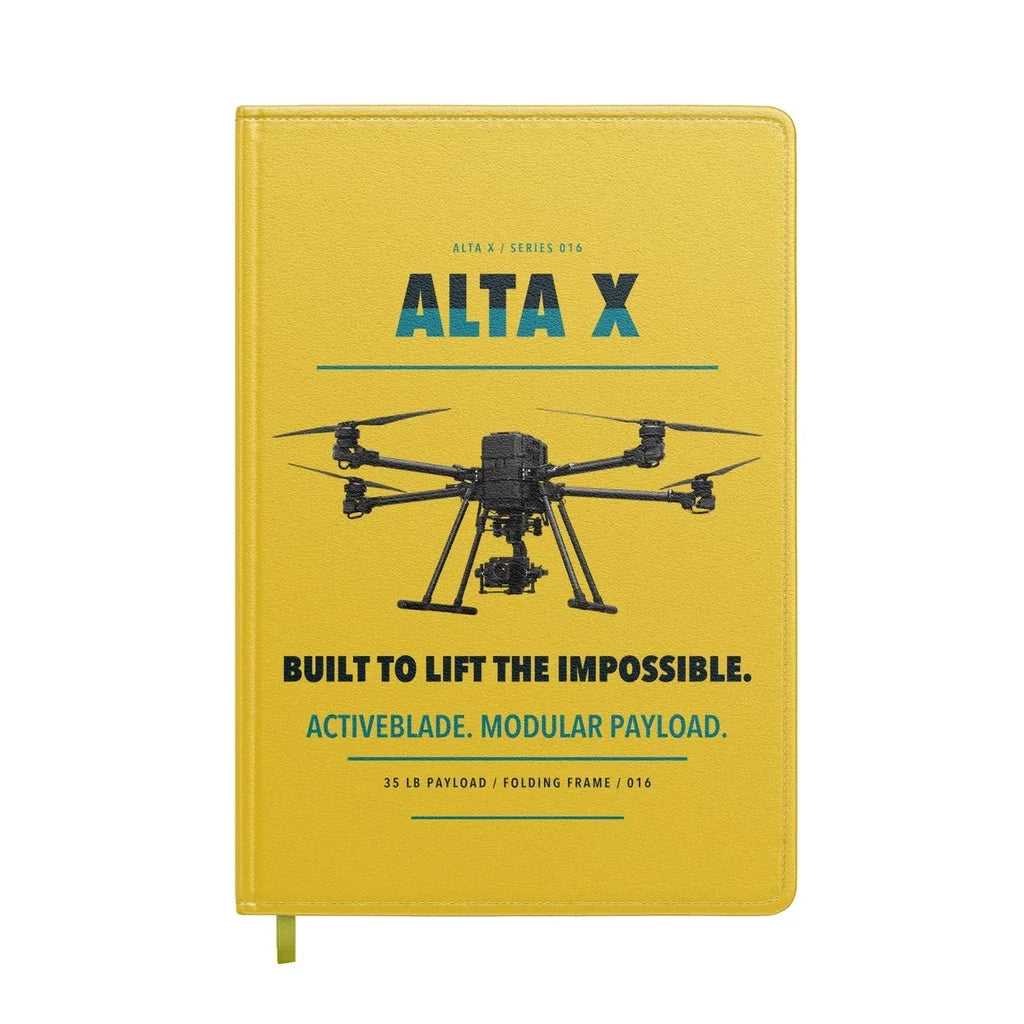 Freefly Alta X design on yellow notebook