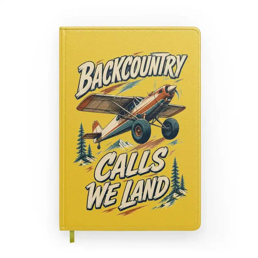 Backcountry Calls We Land design on yellow notebook