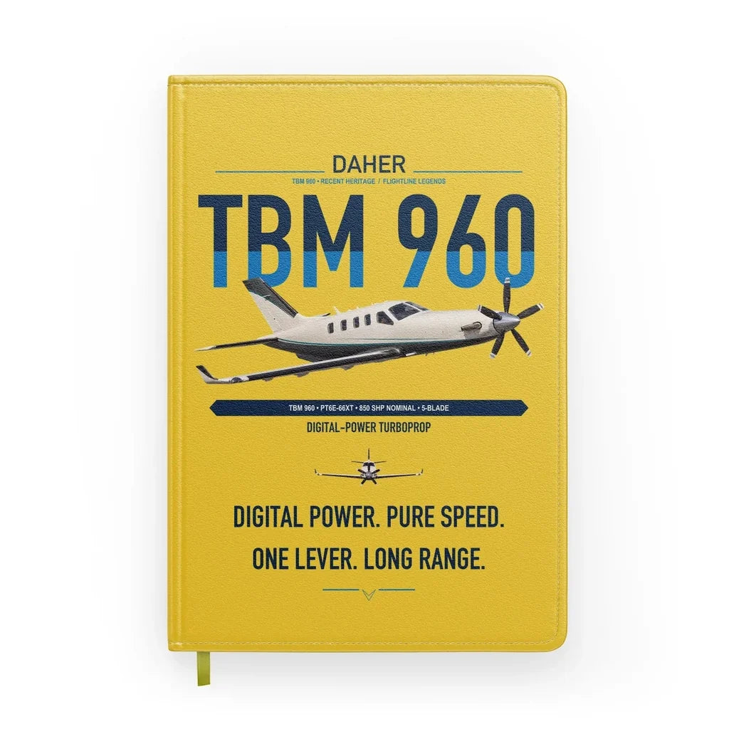 Daher TBM 960 design on yellow notebook