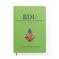 Thumbnail for Raleigh-Durham International Airport (RDU) design on light green notebook
