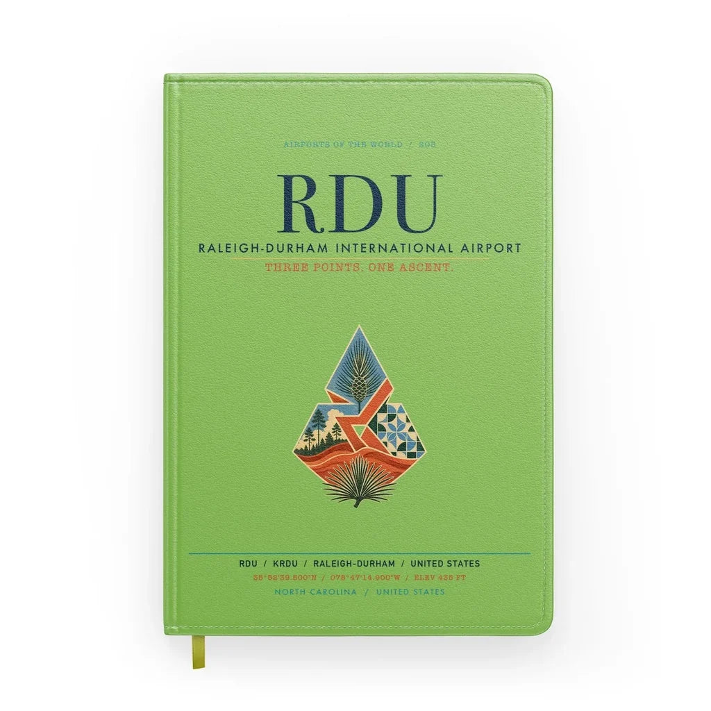 Raleigh-Durham International Airport (RDU) design on light green notebook
