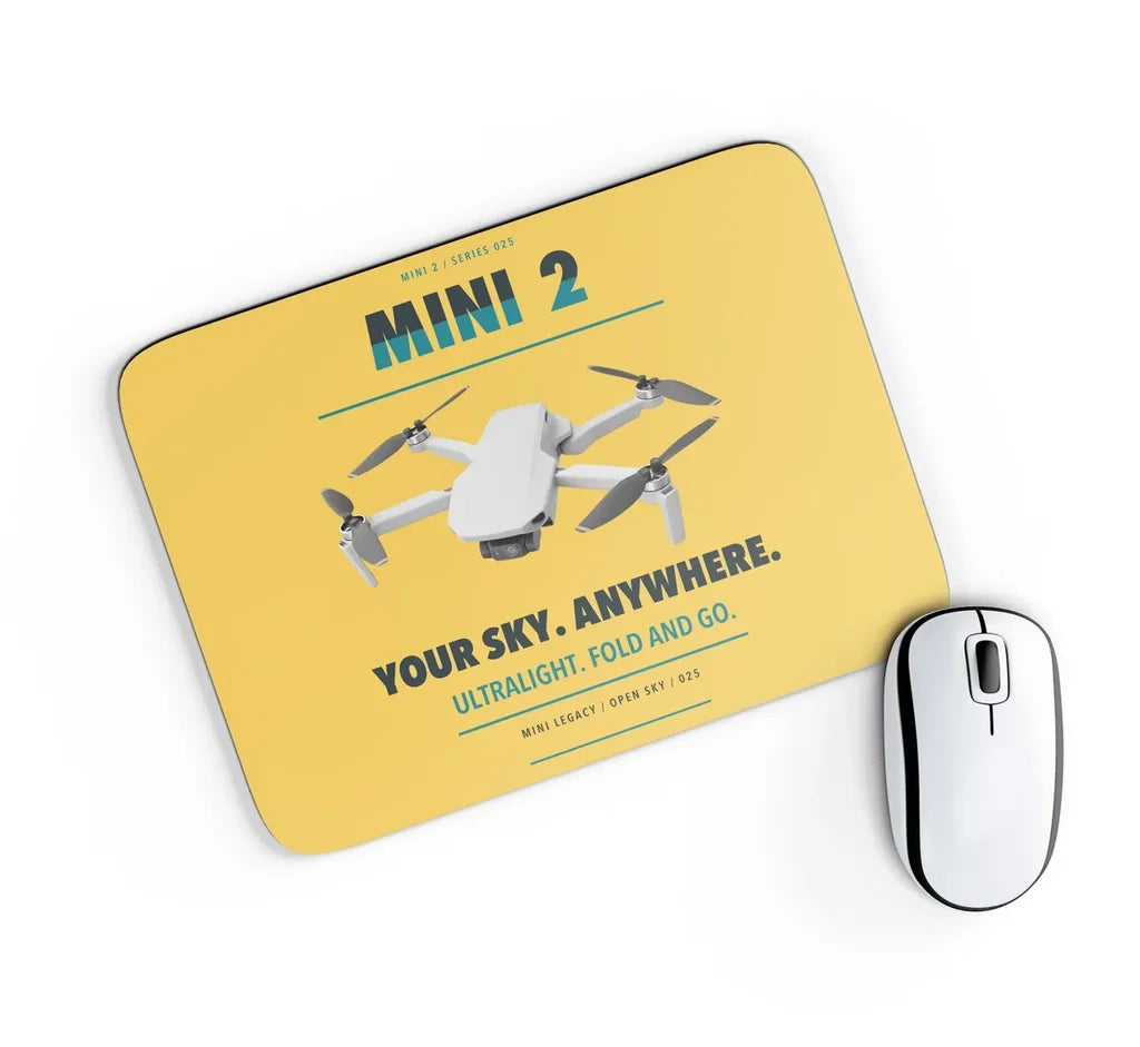 DJI Mini 2 design on yellow rectangle mouse pad
