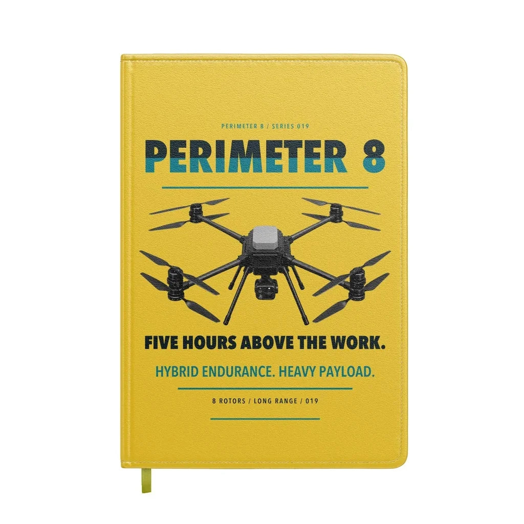 Skyfront Perimeter 8 design on yellow notebook