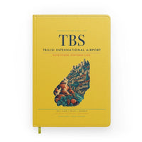 Thumbnail for Tbilisi International Airport (TBS) design on yellow notebook