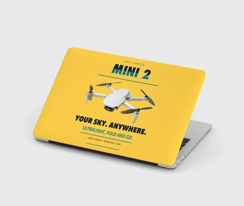 DJI Mini 2 design on yellow MacBook case