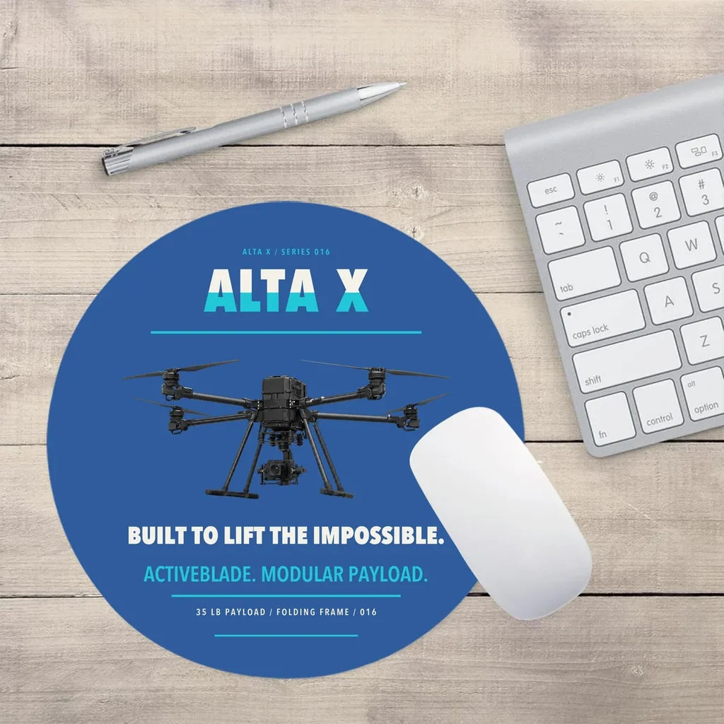 Freefly Alta X design on blue round mouse pad