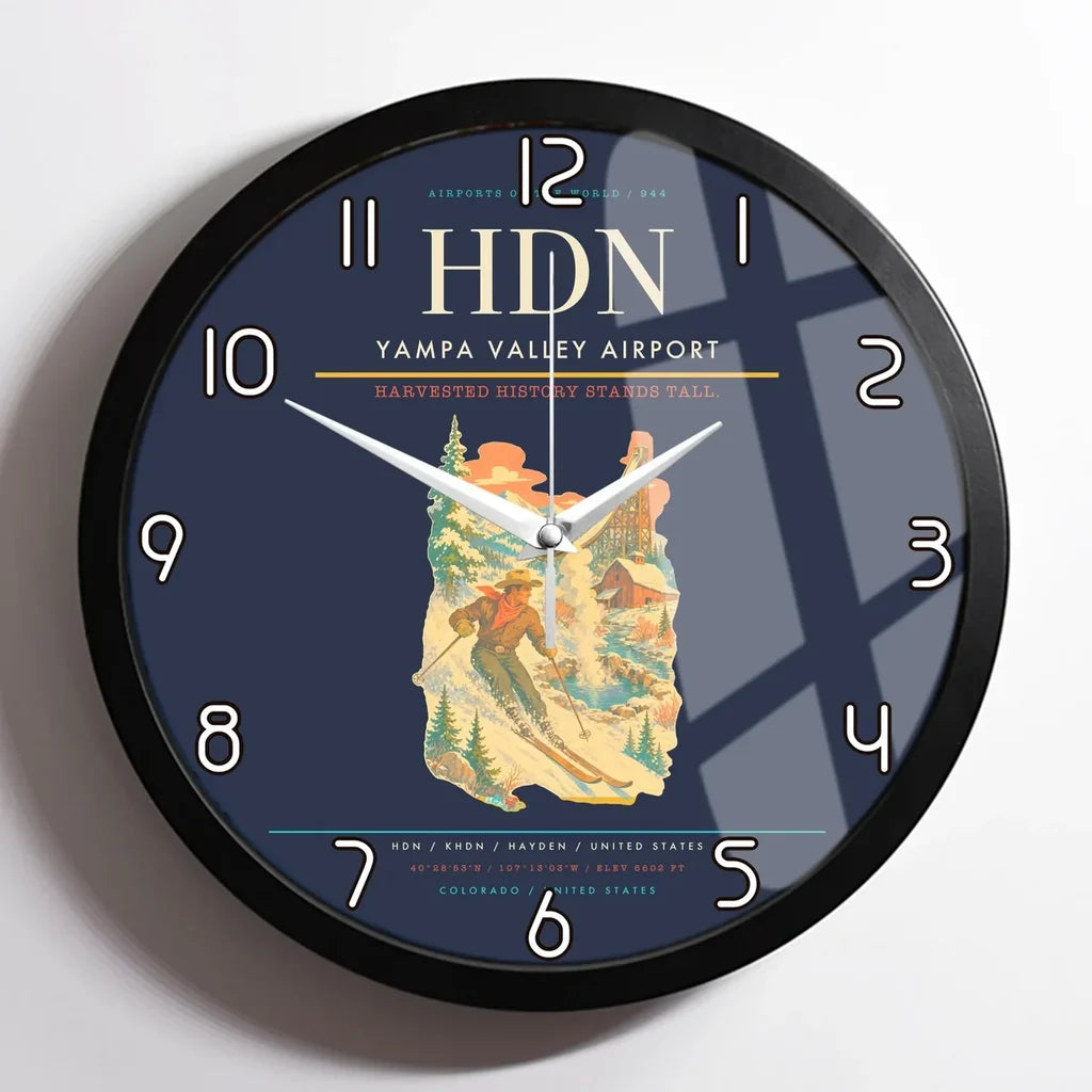 Yampa Valley Airport (HDN) design on navy blue framed wall clock