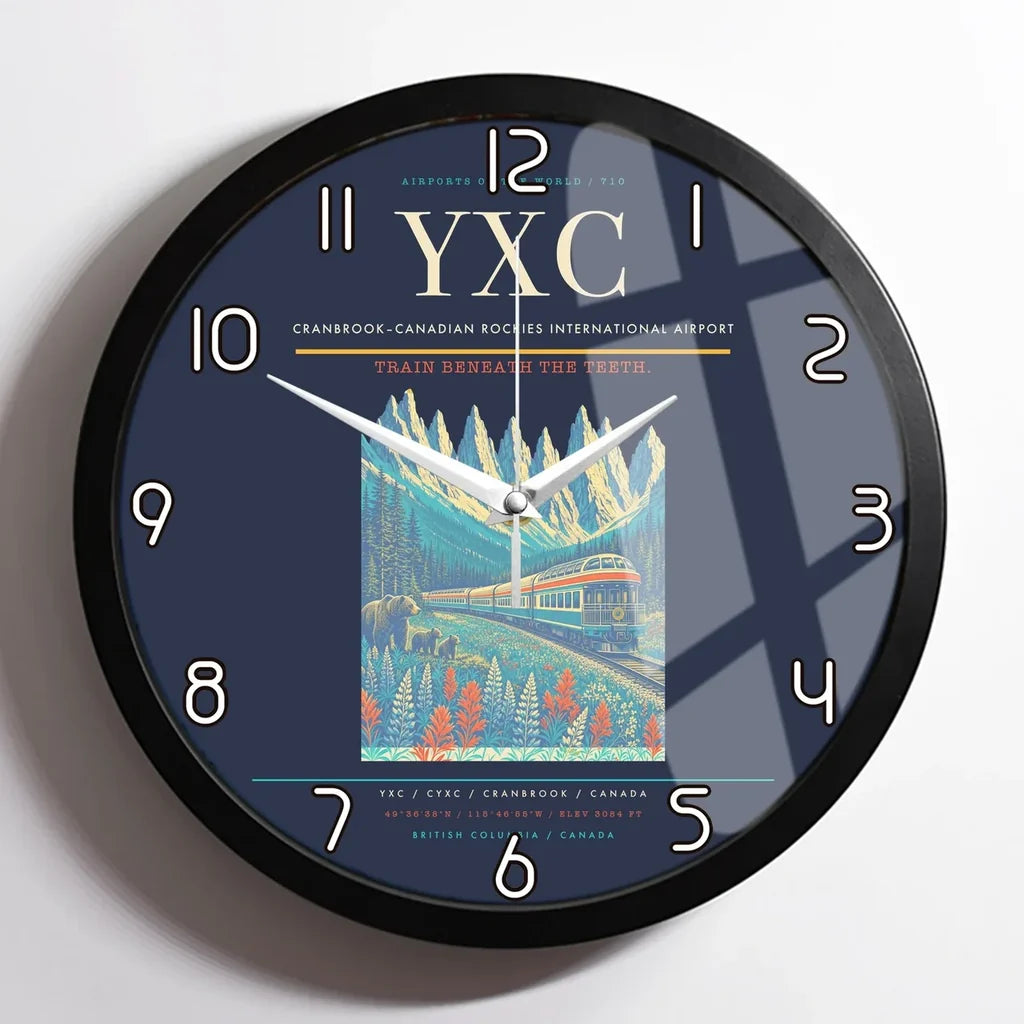 Cranbrook–Canadian Rockies International Airport (YXC) design on navy blue framed wall clock