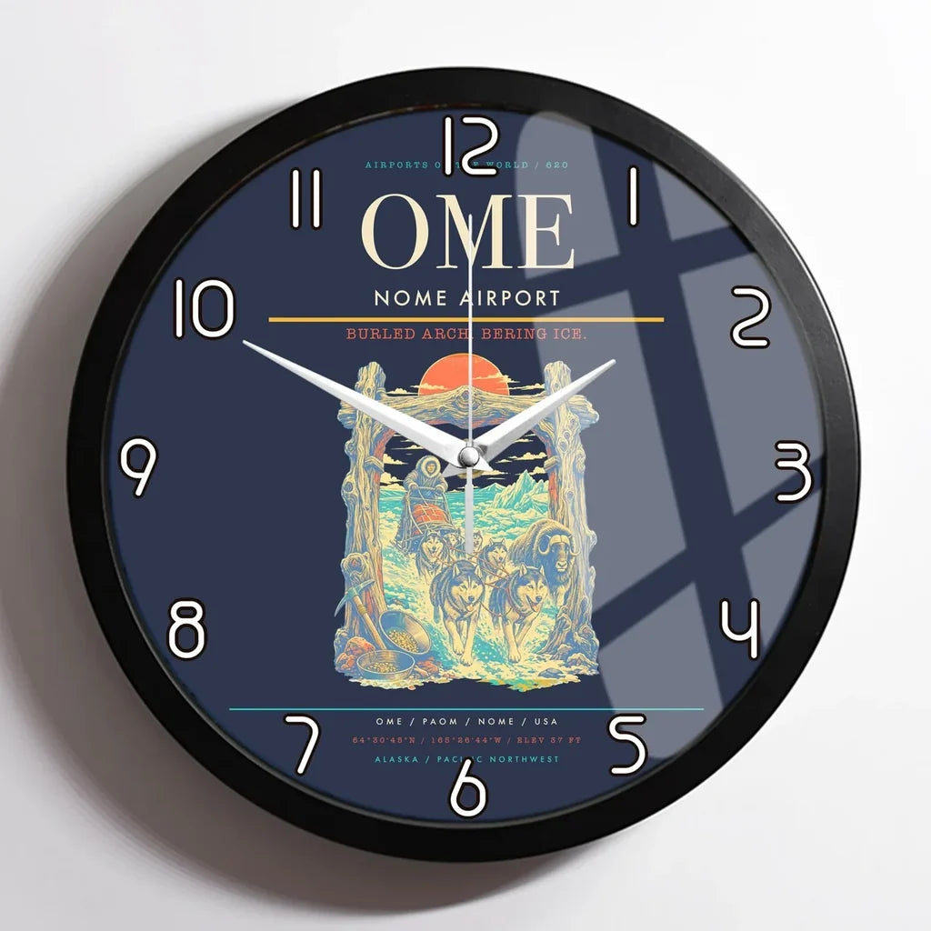 Nome Airport (OME) design on navy blue framed wall clock